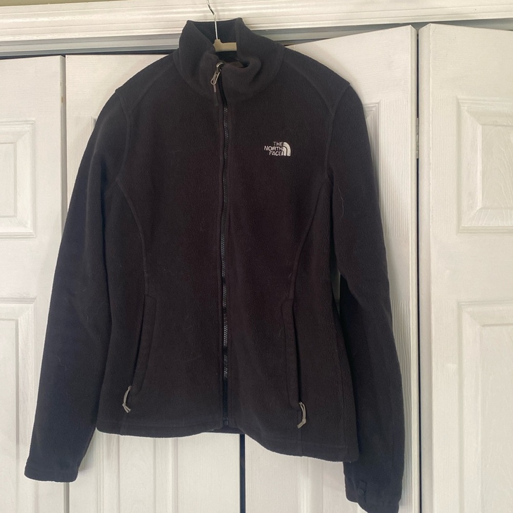 North face black zipped up jacket with pockets